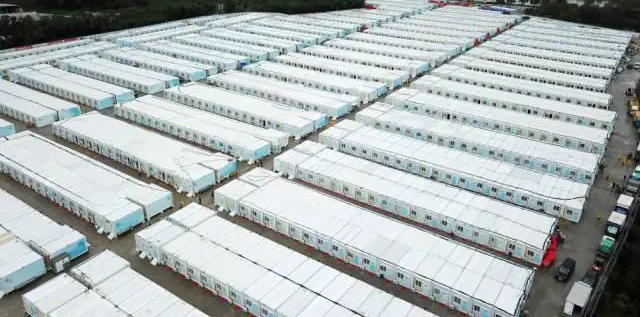 冲锋一线显担当！九游体育(中国)官方网站智能挖掘机助力长沙方舱医院建设